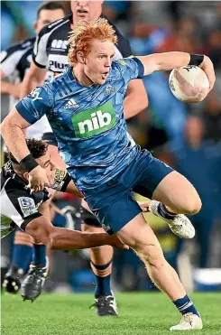  ?? PHOTOSPORT ?? Blues halfback Finlay Christie surges away for a try last night against the Brumbies at Eden Park.