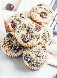  ?? CHELSEA ZWIEG ?? Sweet cherries are the star in these poppy seed muffins.