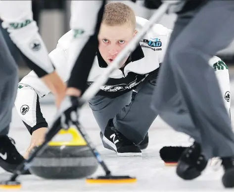  ?? MICHELLE BERG ?? Saskatoon’s Colton Flasch watches his shot during the men’s College Clean Restoratio­n Curling Classic final against Chang-Min Kim’s rink from South Korea Monday at Nutana Curling Club. Flasch’s squad won its first World Curling Tour title of the season...