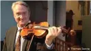  ??  ?? Professor Daniel Gaeda presents the Guarneri violin that Sophie Hagemann played