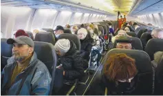  ?? (Yossi Zeliger/Flash90) ?? UKRAINIAN JEWS who fled war zones in the Ukraine arrive at Ben-Gurion Airport on a rescue flight in March.