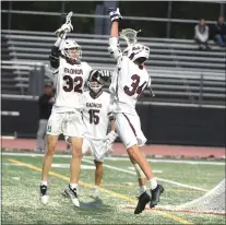  ?? PETE BANNAN — MEDIANEWS GROUP ?? Radnor’s Ryan Goldstein, left, and Owen Knight celebrate Knight’s goal, assisted by Goldstein, in the first half of the District 1Class 3A final at Ridley. Goldstein led Radnor on a 14-3 romp for the title.