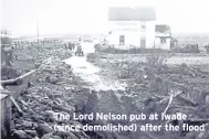  ?? ?? The Lord Nelson pub at Iwade (since demolished) after the flood