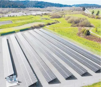  ?? BLUE LAKE RANCHERIA 2017 ?? An aerial photo shows a solar array that is paired with a microgrid in Blue Lake, California. A Native American reservatio­n on California’s far northern coast kept the power flowing in Humboldt County with the help of microgrids during 2019 blackouts.
