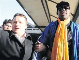  ?? WANG ZHAO / AFP / GETTY IMAGES FILES ?? Michael Spavor arrives at Beijing airport with former NBA basketball star Dennis Rodman after a visit to North Korea in 2014. Spavor has been identified as the second Canadian being held by Chinese authoritie­s since the arrest of Meng Wanzhou.