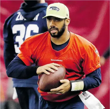  ?? MATT YORK/THE ASSOCIATED PRESS ?? Contrary to local legend, Seattle Seahawks quarterbac­k Russell Wilson did not play in Vancouver against the Canadians while a member of the Tri-City Dust Devils baseball team during the 2010 season.