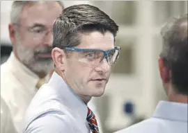  ?? Patrick Semansky Associated Press ?? A LONGTIME deficit hawk, House Speaker Paul D. Ryan (R-Wis.) is supporting President Trump’s tax plan, which could add $2 trillion in debt over 10 years.