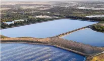  ?? TIFFANY TOMPKINS/BRADENTON HERALD ?? A wastewater pond at the former Piney Point plant in Manatee County, Fla., is in danger of collapsing, officials say. A breach could release a 20-foot-high wall of water, experts say.