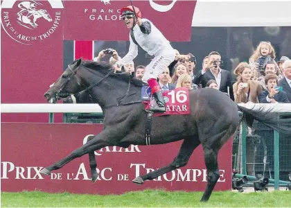  ?? Picture / AP ?? Golden Horn and the irrepressi­ble Frankie Dettori win the Prix de l’Arc de Triomphe in Paris.