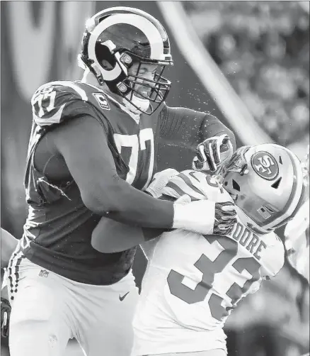  ?? Wally Skalij Los Angeles Times ?? RAMS TACKLE
Andrew Whitworth seems to have the upper hand against San Francisco’s Tarvarius Moore last season.