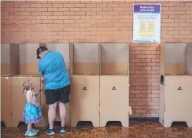  ?? ?? Voice refendum voting in Muswellbro­ok. Picture: Roni Bintang/Getty Images