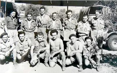  ??  ?? The Long Range Desert Group. Norman Gedye is pictured at the centre-front, wearing a beret.