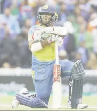  ??  ?? Sri Lanka’s Kusal Mendis looks dejected after being run out (Reuters / Peter Cziborra)