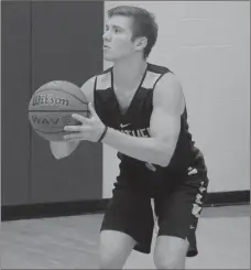  ?? Graham Thomas/Siloam Sunday ?? Siloam Springs senior boys basketball guard Drew Vachon prepares to take a 3-pointer from the corner during practice inside the Panther Den at Siloam Springs High School on Thursday, July 25.