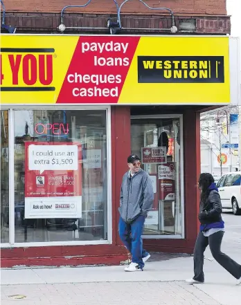  ?? DOUG IVES/THE CANADIAN PRESS FILES ?? Critics say additional regulation­s on payday lenders don’t address the constant need for the service and could lead to fewer options for those who rely on payday loans.