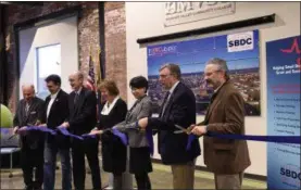  ?? SUBMITTED PHOTO ?? From left: Frank DuRoss, vice president of Community Developmen­t and executive director of the MVCC Foundation; Robert Palmieri, Utica mayor; Dr. Randall VanWagoner, MVCC president; Roxanne Mutchler, Mohawk Valley SBDC Director; Dr. Grace Wang, SUNY Poly interim president; Brian Miller, assemblyma­n from District 101; and Bernard Paprocki, SBA Syracuse District director.