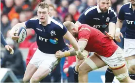  ??  ?? Sumptuous: Stuart Hogg on the run against Wales