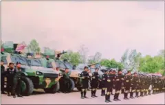  ?? MECH DARA ?? A line of VN4 personnel carriers on display at the military games on Phnom Penh’s Koh Pich last week.