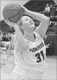  ?? Westside Eagle Observer file photo/RANDY MOLL ?? Gentry’s Emily Toland, a sophomore, looks to shoot under the basket during the Dec. 18 game between Gentry and Gravette at Gentry High School. RANDY MOLL rmoll@nwadg.com