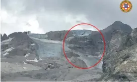  ?? ?? The ice glacier collapse on Marmolada mountain. Photograph: Alpine Rescue Services/ Reuters