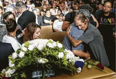  ?? Photos by Sandy Huffaker / Getty Images ?? Antonio Basco greets well-wishers to a public memorial for his wife, Margie Reckard, who was killed in the El Paso attack on Aug. 3. Worried that he would have to bury his partner of 22 years alone, Basco invited the public to join him.