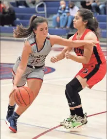  ?? Danielle Pickett, General Photograph­y ?? Reese Abercrombi­e drives to drive past a Dalton player during a middle school game in Boynton last Tuesday.