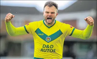  ?? Picture: Ian Scammell ?? Ashford striker Gary Lockyer celebrates after making it 3-1 at VCD