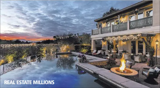  ?? PHOTOS BY DAVID REISMAN/REAL ESTATE MILLIONS ?? Former California residents Michael and Janeen Damian purchased their 5,000-square-foot home in June for $1.175 million. It had sold for $1.705 million 10 years earlier, and then for $830,000 in 2009. It is in Henderson’s MacDonald Highlands community.