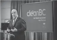  ?? DARRYL DYCK / THE CANADIAN PRESS ?? B.C. Premier John Horgan speaks Wednesday about the Cleanbc plan aimed at reducing carbon.