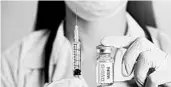  ?? DREAMSTIME ?? Making vaccines mandatory, such as one for COVID-19, a tie to employment could bring objections from workers.