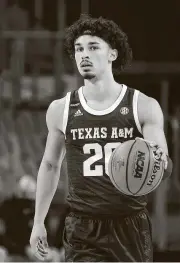  ?? Ron Jenkins / Associated Press ?? Texas A&M guard Andre Gordon hit the decisive shot vs. Auburn and is a key presence for A&M.