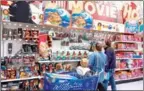  ?? PAUL J RICHARDS/AFP ?? Shoppers browse inside a Toys ‘R’ Us in Fairfax, Virginia.