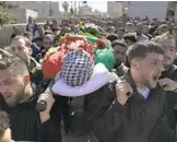  ?? NASSER NASSER AP ?? Relatives mourn 17-year-old American Tawfic Abdel Jabbar at his funeral in the Palestinia­n village of Al-mazra’a ash-sharqiya, West Bank.