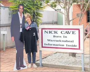  ?? Picture: RACHEL DECKERT ?? RE-LAUNCH: Warracknab­eal Arts Council president Jenny Taylor is among community members exploring funding options to build a $200,000 statue of renowned musician Nick Cave in the town.