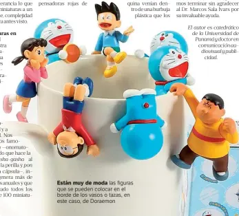  ??  ?? Están muy de moda las figuras que se pueden colocar en el borde de los vasos o tazas, en este caso, de Doraemon