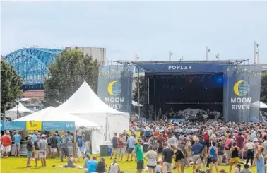  ?? STAFF PHOTO BY ERIN O. SMITH ?? Coolidge Park fills with festival-goers during the fist Moon River Music Festival in 2018. The first festival was sold out.