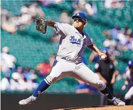  ?? TED S. WARREN/ASSOCIATED PRESS ?? Los Angeles Dodgers pitcher Julio Urías struck out a career-high 11 batters and allowed one hit in seven innings against the Seattle Mariners.
