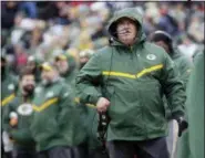  ?? MIKE ROEMER — THE ASSOCIATED PRESS ?? Green Bay Packers’ Head Coach Mike McCarthy watches a replay on the scoreboard during the first half of an NFL football game against the Arizona Cardinals Sunday in Green Bay, Wis.