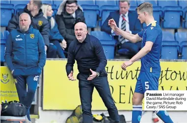  ?? ?? Passion Livi manager David Martindale during the game. Picture: Rob Casey / SNS Group