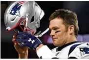  ?? ADRIAN KRAUS / ASSOCIATED PRESS ?? New England Patriots quarterbac­k Tom Brady will spend training camp adjusting to not having his favorite target, tight end Rob Gronkowski, available. Gronkowski retired in the offseason.