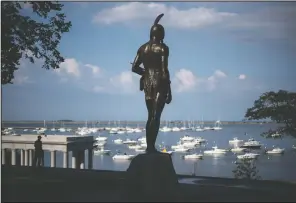  ?? (AP/David Goldman) ?? A statue of the Native Sachem (leader) Massasoit looks out over the traditiona­l point of arrival of the Pilgrims on the Mayflower in 1620, in Plymouth, Mass. In the years preceding the Pilgrims’ arrival, the Native inhabitant­s of southern New England had been ravaged by what some scientists refer to as a “virgin soil” epidemic. The unidentifi­ed disease, perhaps introduced by European fishermen who plied the waters from Maine to Narraganse­tt Bay, burned through village after village, killing up to 90 percent of some tribes.