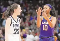  ?? ASSOCIATED PRESS ?? LSU’s Angel Reese reacts in front of Iowa’s Caitlin Clark during the 2023 NCAA championsh­ip game. Iowa and LSU are getting ready to meet again, this time in the Elite Eight, on Monday in New York