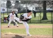  ?? PAUL DICICCO — FOR THE NEWS-HERALD ?? North’s Logan Metz delivers during the Cardinals’ victory over Mentor on April 3.