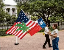  ?? Jay Janner/Austin American-Statesman via Associated Press ?? Fancy Fairchild participat­es in a rally to legalize marijuana on April 20, 2022, at the Governor’s Mansion in Austin.