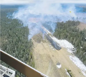  ?? ALBERTA WILDFIRE VIA THE CANADIAN PRESS ?? A wildfire burns near Edson, Alta. on Tuesday. A natural gas pipeline owned by TC Energy Corp. ruptured, sparking the blaze.