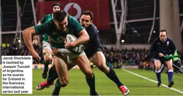  ??  ?? Jacob Stockdale is tackled by Joaquin Tuculet of Argentina as he scores for Ireland in the Guinness internatio­nal series last year