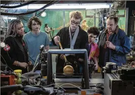  ?? COLUMBIA PICTURES/SONY VIA AP ?? British comedian James Acaster (center) is flanked by (from left) Celeste O’Connor, Finn Wolfhard, Logan Kim and Dan Aykroyd in a scene from “Ghostbuste­rs: Frozen Empire.” Acaster is a newcomer to the franchise.