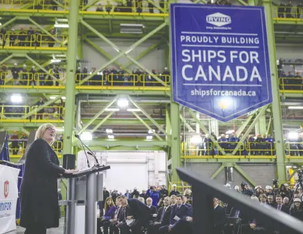  ?? DARREN CALABRESE / THE CANADIAN PRESS FILES ?? Carla Qualtrough, minister of public services and procuremen­t and accessibil­ity, announces Lockheed Martin Canada as the designer of 15 new ships to be built at Irving Shipbuildi­ng’s Halifax shipyard in February. Questions are being raised about the industrial benefit credit given to Irving.