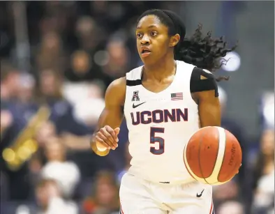  ?? Maddie Meyer / Getty Images ?? Crystal Dangerfiel­d of the UConn Huskies dribbles down court during USA Women’s National Team Winter Tour 2020 game between the United States and the UConn Huskies at The XL Center on Jan. 27 in Hartford.