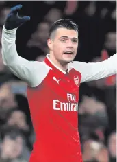  ??  ?? Turnaround: Nacho Monreal celebrates Arsenal’s equaliser and (above) Granit Xhaka after hitting the winner